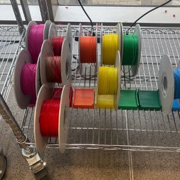 Nearly-empty filament spools in the fabrication lab