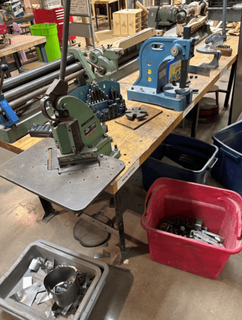 Scrap sheet metal workshop where BloomLight petals are crafted